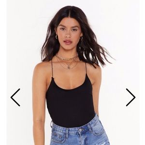 Nasty Gal Black Strappy Bodysuit. NWT.
